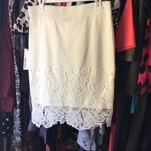 White skirt with lace hem